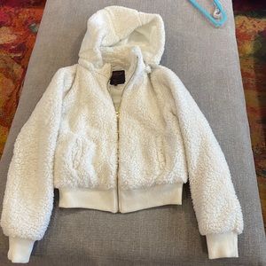 White, puffy, girls jacket.  Hood zips off. Barley used